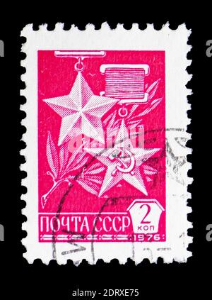 MOSCA, RUSSIA - 14 FEBBRAIO 2019: Un francobollo stampato in URSS (Russia) mostra le medaglie 'Gold Star' e 'Hammer and Sickle', numero definitivo N.12 serie, c. Foto Stock