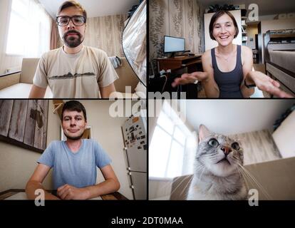 Immagine di uno schermo di compagni di squadra che fanno un happy hour virtuale dai loro uffici domestici. Incontro di squadra da casa sorridendo colleghi multietnici parlare onl Foto Stock