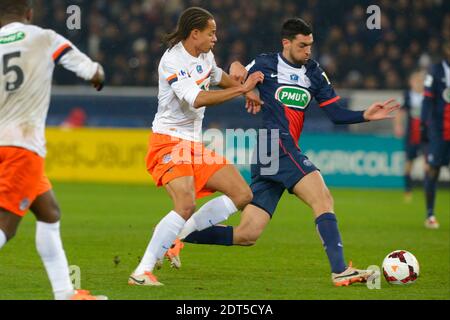 Javier Pastore del PSG ha combattuto contro Daniel Congre di Montpellier durante la partita di calcio della Coppa di Francia 1/16e, Paris Saint-Germain vs Montpellier HSC al Parc des Princes di Parigi, Francia, il 22 gennaio 2014. Montpellier ha vinto 2-1. Foto di Henri Szwarc/ABACAPRESS.COM Foto Stock