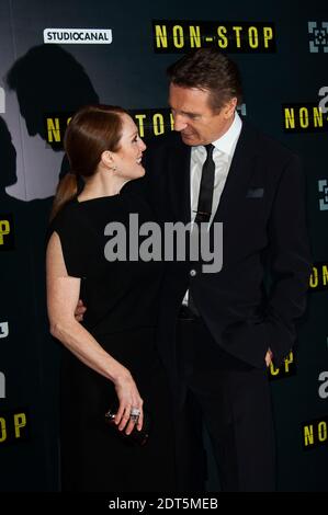 Julianne Moore e Liam Neeson partecipano alla prima francese del film 'NON STOP' tenuto al Gaumont Opera Cinema di Parigi, Francia, il 27 2014 gennaio. Foto di Nicolas Genin/ABACAPRESS.COM Foto Stock