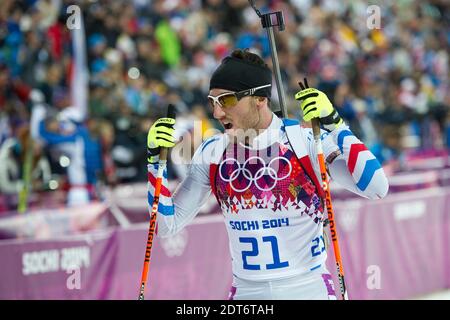 Jean-Guillaume Beatrice di Francia compete nell'individuo di 20 km di Biathlon Men durante il sesto giorno delle Olimpiadi invernali Sochi 2014 al Centro di sci di fondo e biathlon di Laura a Sochi, Russia, il 13 febbraio 2014. Foto di Laurent Zabulon/ABACAPRESS.COM Foto Stock