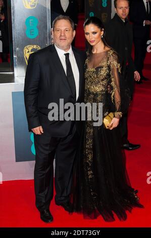 il produttore Harvey Weinstein e la stilista di moda inglese Georgina Chapman arrivano per i 2014 EE British Academy Film Awards (BAFTA) che si sono tenuti presso la Royal Opera House di Bow Street, Londra, Regno Unito il 16 febbraio 2014. Foto di Nicolas Genin/ABACAPRESS.COM Foto Stock