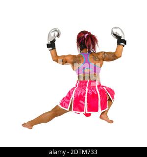 La boxer femminile flette i muscoli Foto Stock