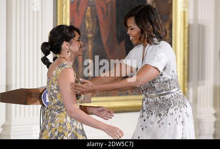 La cantante Norah Jones e la First Lady Michelle Obama partecipano ad un evento per onorare le madri militari nella stanza orientale della Casa Bianca 12 maggio 2014 a Washington, DC. Foto di Olivier Douliery/ABACAUSA.COM Foto Stock