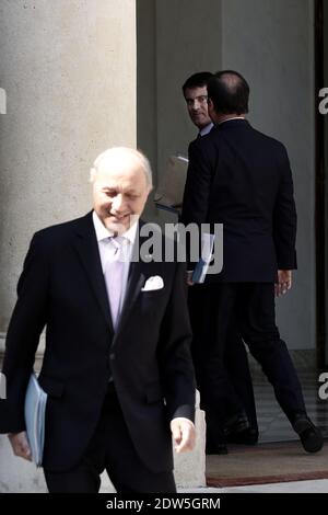 Il presidente francese Francois Hollande, il ministro degli Affari esteri e dello sviluppo internazionale Laurent Fabius e il primo ministro Manuel Valls lasciano la riunione settimanale del gabinetto al Palazzo presidenziale Elysee, a Parigi, in Francia, il 14 maggio 2014. Foto di Stephane Lemouton/ABACAPRESS.COM Foto Stock