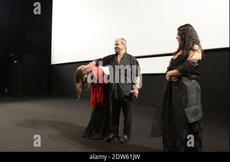 L-R : i registi Wiam Simav Bedirxan, Ossama Mohammed e Noma Omran hanno visto prima della proiezione del loro film 'Silvered Water, Siria Self-Ritratto', il terzo giorno del 67a Festival del Cinema a Cannes, in Francia, il 16 maggio 2014. Wiam Simav Bedirxan è appena arrivato da Homs in Siria, ed è stato mosso dalla reazione pubblica e applausi per ricevere lei e il suo film. Foto di Ammar Abd Rabbo//ABACAPRESS.COM Foto Stock