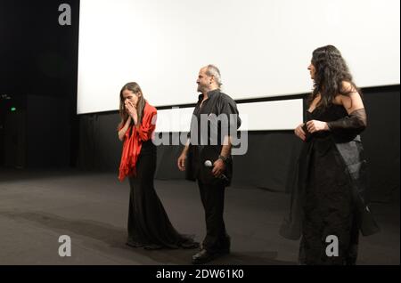 L-R : i registi Wiam Simav Bedirxan, Ossama Mohammed e Noma Omran hanno visto prima della proiezione del loro film 'Silvered Water, Siria Self-Ritratto', il terzo giorno del 67a Festival del Cinema a Cannes, in Francia, il 16 maggio 2014. Wiam Simav Bedirxan è appena arrivato da Homs in Siria, ed è stato mosso dalla reazione pubblica e applausi per ricevere lei e il suo film. Foto di Ammar Abd Rabbo//ABACAPRESS.COM Foto Stock