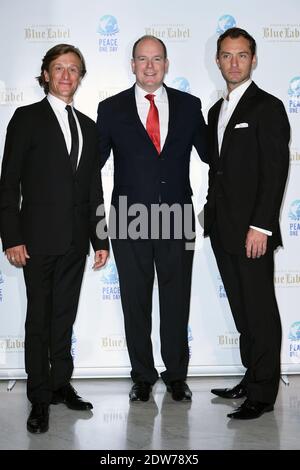 Jeremy Gilley, fondatore dell'organizzazione no-profit 'Peace One Day', il principe Alberto di Monaco e Jude Law, partecipa al 'Peace One Day Monaco Gala' tenutosi nella Salle des Etoiles allo Sporting Monte-Carlo di Monte-Carlo, Monaco, il 22 maggio 2014. L’evento benefico è a favore del lavoro educativo di un giorno per la Pace nella Repubblica Democratica del Congo e nella regione dei grandi Laghi in Africa. Foto di Nicolas Gouhier/ABACAPRESS.COM Foto Stock