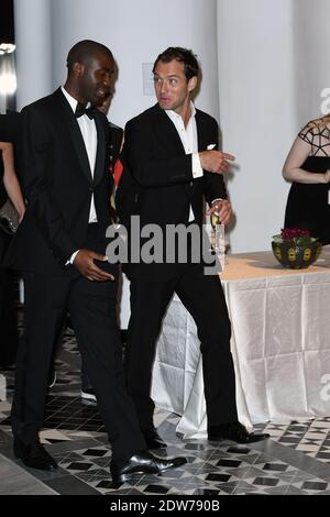 Jude Law e Fabrice Muamba partecipano al 'Peace One Day Monaco Gala' tenutosi nella Salle des Etoiles allo Sporting Monte-Carlo di Monte-Carlo, Monaco, il 22 maggio 2014. L’evento benefico è a favore del lavoro educativo di un giorno per la Pace nella Repubblica Democratica del Congo e nella regione dei grandi Laghi in Africa. Foto di Nicolas Gouhier/ABACAPRESS.COM Foto Stock