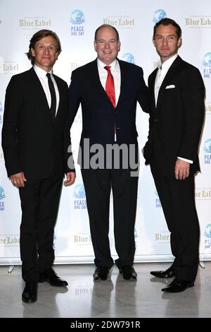 Jeremy Gilley, fondatore dell'organizzazione no-profit 'Peace One Day', il principe Alberto di Monaco e Jude Law, partecipa al 'Peace One Day Monaco Gala' tenutosi nella Salle des Etoiles allo Sporting Monte-Carlo di Monte-Carlo, Monaco, il 22 maggio 2014. L’evento benefico è a favore del lavoro educativo di un giorno per la Pace nella Repubblica Democratica del Congo e nella regione dei grandi Laghi in Africa. Foto di Nicolas Gouhier/ABACAPRESS.COM Foto Stock