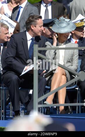 Il primo ministro David Cameron e sua moglie Samantha partecipano alla cerimonia biennale Francia-Regno Unito presso il cimitero delle tombe di guerra del Commonwealth a Bayeux, come parte delle cerimonie ufficiali in occasione del 70° anniversario del D-Day, il 6 giugno 2014 in Normandia, Francia. Foto di Abd Rabbo-Bernard-Gouhier-Mousse/ABACAPRESS.COM Foto Stock