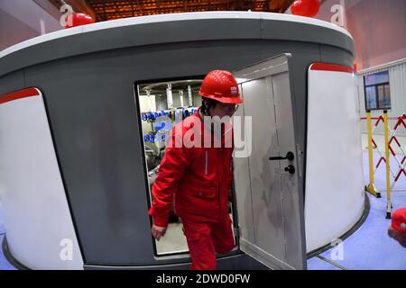 L'ultima unità a turbina della centrale di stoccaggio a pompaggio Jixi è collegata alla rete elettrica per la generazione di energia, il che indica che il più grande numero di pum della Cina Foto Stock