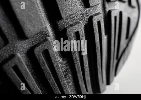 primo piano della suola in gomma nera dell'istruttore Foto Stock