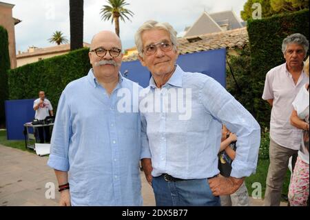 Il fotografo Gerard Schachmes e Bernard D'ormale partecipano alla mostra fotografica Brigitte Bardot 'Brigitte for Ever' a Saint-Tropez, Francia, 26 luglio 2014. Foto di Laurene Favier/ABACAPRESS.COM Foto Stock