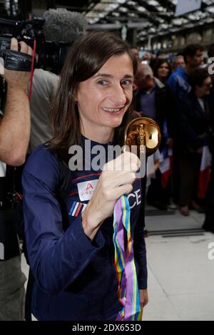 Atleta francese Christelle Daunay in arrivo alla Gare de Lyon il 18 agosto 2014 a Parigi. La squadra nazionale francese di atletica ha vinto 23 medaglie al Campionato europeo di atletica di Zurigo la scorsa settimana. Foto di Jerome Domine/ABACAPRESS.COM Foto Stock