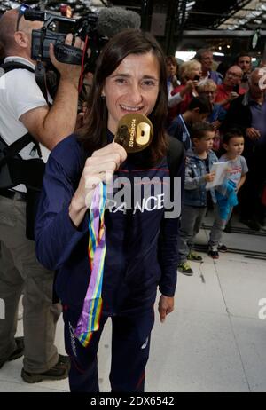 Atleta francese Christelle Daunay in arrivo alla Gare de Lyon il 18 agosto 2014 a Parigi. La squadra nazionale francese di atletica ha vinto 23 medaglie al Campionato europeo di atletica di Zurigo la scorsa settimana. Foto di Jerome Domine/ABACAPRESS.COM Foto Stock