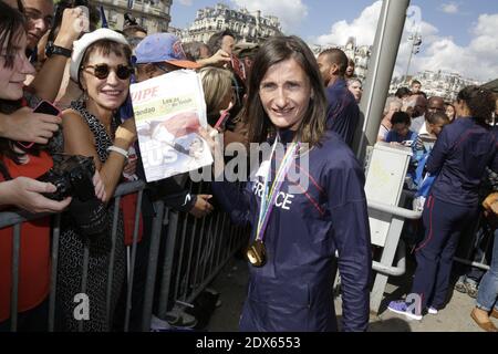 Atleta francese Christelle Daunay in arrivo alla Gare de Lyon il 18 agosto 2014 a Parigi. La squadra nazionale francese di atletica ha vinto 23 medaglie al Campionato europeo di atletica di Zurigo la scorsa settimana. Foto di Jerome Domine/ABACAPRESS.COM Foto Stock