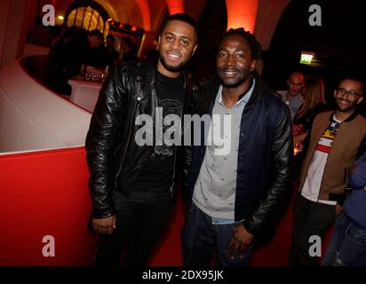 Axel Tony e Noom Diawara partecipano al lancio del nuovo gioco FIFA 2015 (chiamato anche FIFA 15) che si è tenuto presso l'Opera Restaurant di Parigi, Francia, il 22 settembre 2014. Foto di Jerome Domine/ABACAPRESS.COM Foto Stock