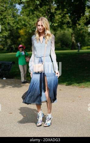 Poppy Delevingne, modello inglese e socialita, in arrivo allo spettacolo Burberry Prorsum Ready-to Wear Primavera-Estate 2015, tenuto a West Albert Lawn, Kensington Gardens, Londra, Regno Unito il 15 settembre 2014. Foto di Sophie Mhabille/ABACAPRESS.COM Foto Stock