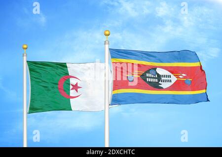 Algeria ed Eswatini Swaziland due bandiere su paletti e blu cielo Foto Stock
