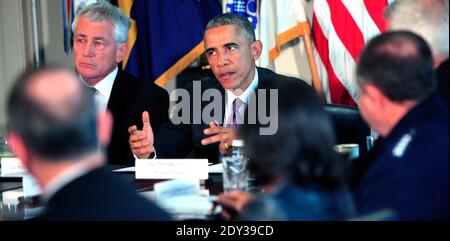 Il presidente Barack Obama incontra la dirigenza militare Senior al Pentagono il 6 ottobre 2014 il segretario di destra della difesa Chuck Hagel, POTUS.Washington, DC, USA, foto di Dennis Brack/Pool/ABACAPRESS.COM Foto Stock