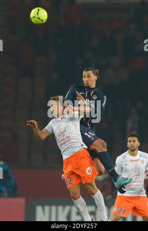 Zlatan Ibrahimovic della PSG combatté contro Benjamin Stambouli di Montpellier durante la prima partita di calcio della Francia, Paris Saint-Germain vs Montpellier HSC al Parc des Princes di Parigi, Francia, il 29 marzo 2013. PSG ha vinto 1-0. Foto di Henri Szwarc/ABACAPRESS.COM Foto Stock