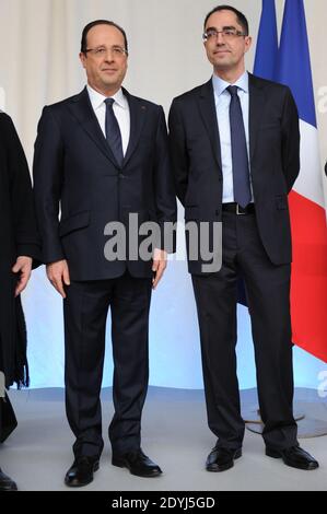 Il presidente Francois Hollande e il direttore del Musee du Louvre Jean Luc Martinez presenziano ad un ricevimento in onore della partenza di Henri Loyrette a Parigi, Francia, il 9 aprile 2013. Foto Nicolas Gouhier/ABACAPRESS.COM Foto Stock