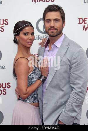 Roselyn Sanchez, Eric Winter, Lifetime Original Series Devious Maids prima festa al Bel Air Bay Club, Pacific Palisades, Los Angeles, CA, USA. 17 giugno 2013 (nella foto: Roselyn Sanchez, Eric Inverno). Foto di Baxter/ABACAPRESS.COM Foto Stock