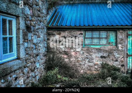 Fronte di Cottages sulla Santa Isola di Lindisfarne Foto Stock