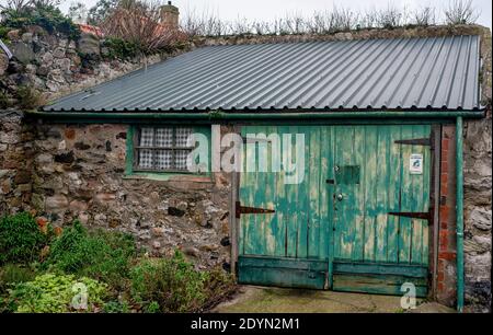 Fronte di Cottages sulla Santa Isola di Lindisfarne Foto Stock