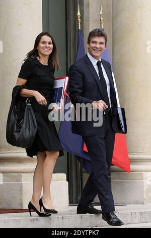 Il Ministro francese della cultura Aurele Filippetti e il Ministro francese per il rinnovamento industriale e l'industria alimentare Arnaud Montebourg lasciano il Palazzo presidenziale Elysee dopo la riunione settimanale del gabinetto, tenutasi a Parigi, in Francia, il 18 settembre 2013. Foto di Stephane Lemouton/ABACAPRESS.COM Foto Stock