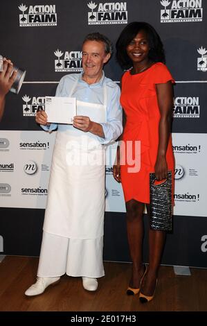 Alain Passard e Kareen Guiock partecipano all'evento benefico 'NE les Oublions Pas' Action Contre la Faim al Grand Palais, a Parigi, Francia, il 20 novembre 2013. Foto di Aurore Marechal/ABACAPRESS.COM Foto Stock