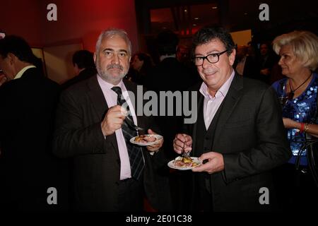 Guy Savoy e Christian Constant partecipano alla festa 'Grand Prix d'Amerique J-60' all'ippodromo di Vincennes, in Francia, il 26 novembre 2013. Foto Jerome Domine/ABACAPRESS.COM Foto Stock