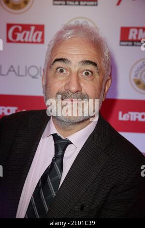 Guy Savoy partecipa alla festa 'Grand Prix d'Amerique J-60' all'Hippodrome de Vincennes, a Vincennes, Francia, il 26 novembre 2013. Foto Jerome Domine/ABACAPRESS.COM Foto Stock