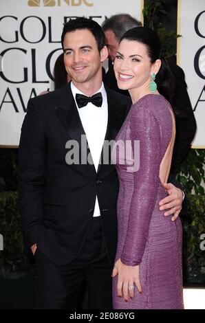 Julianna Margulies e Keith Lieberthal arrivano per la 69° cerimonia annuale dei Golden Globe Awards, tenutasi presso il Beverly Hilton Hotel di Los Angeles, CA, USA il 15 gennaio 2012. Foto di Lionel Hahn/ABACAPRESS.COM Foto Stock