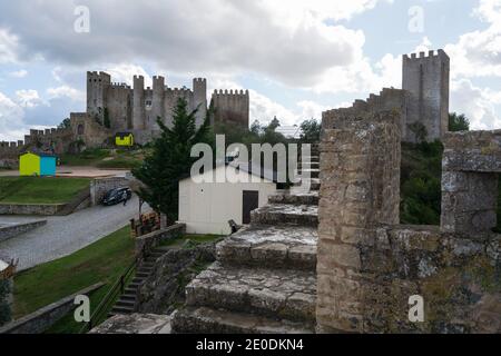 Obidos bellissimo villaggio castello fortezza torre fortificazione in Portogallo Foto Stock