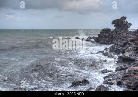 Yongduam Rock a Jeju City, Repubblica di Corea Foto Stock