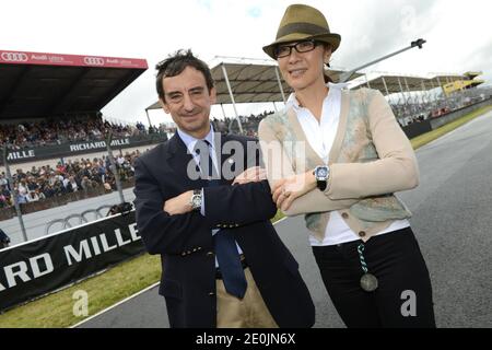 Il presidente francese dell'Automobile Club de l'Ouest (ACO) Pierre Fillon e Michelle Yeoh partecipano alla decima gara classica di le Mans, una gara per le vetture d'epoca di 24 ore di le Mans presso l'autodromo di le Mans, nella Francia occidentale, il 7 luglio 2012. Foto di Guy Durand/ABACAPRESS.COM Foto Stock