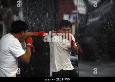 I pugili si allenano tutti i giorni in una delle ultime delle fiorenti palestre di boxe di New York City, Gleason's a Brooklyn, New York, NY, USA, il 20 2012 ottobre. In tutto, 131 campioni del mondo si sono allenati all'interno delle pareti ammane della palestra, tra cui leggende come Jake LaMotta, Muhammad Ali e Roberto Duran. Attualmente cinque possessori di titoli attivi si allenano al Gleason's, così come numerosi concorrenti e decine di campioni di Golden Guoves. Foto di Olivier Douliery/ABACAPRESS.COM Foto Stock