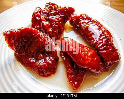Pomodori secchi in olio di girasole Foto Stock