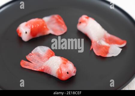Gnocchi di cristallo al vapore a forma di pesce Koi Foto Stock