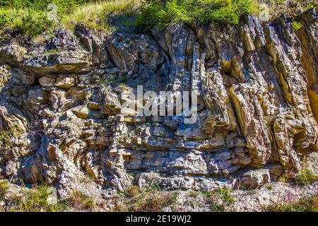 Martello geologico sulle rocce Foto Stock