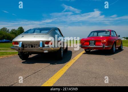 Alfa GT Veloce 1750 (Giulia GTV serie 105) E Lancia Fulvia 1960 vetture sportive italiane Foto Stock