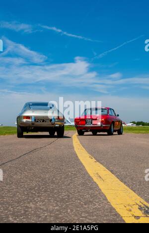 Alfa GT Veloce 1750 (Giulia GTV serie 105) E Lancia Fulvia 1960 vetture sportive italiane Foto Stock