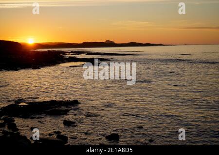 Tramonto sul mare a Seahouses Northumberland Foto Stock
