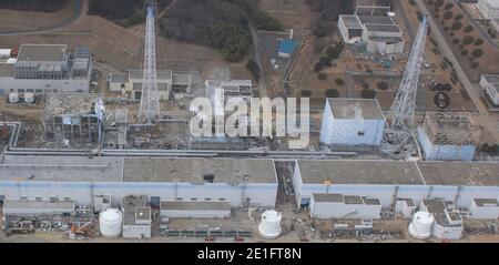 Foto aerea del 20 marzo 2011 scattata da un piccolo drone non presidiato della centrale nucleare di Fukushima dai-ichi a Okumamachi, prefettura di Fukushima, Giappone settentrionale. Da destra a sinistra: Unità 1, unità 2, unità 3 e unità 4. Photo by Air Photo Service via ABACAPRESS.COM Foto Stock