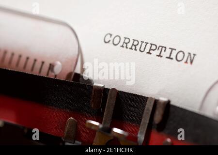 Parola di corruzione scritta con una macchina da scrivere. Foto Stock