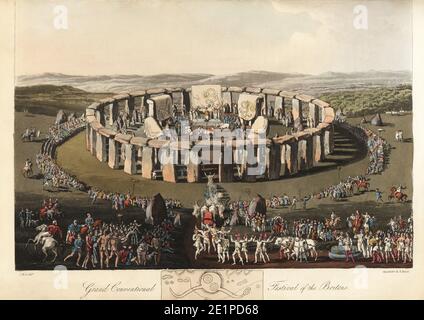 Grand Conventional Festival dei Britannici a Stonehenge, epoca pre-romana. La Druidica cerimonia Helio-arkita la vigilia di maggio, le pietre ricoperte di veli raffiguranti il re drago. Acquatinto colorato a mano di R. Havell da un'illustrazione di Charles Hamilton Smith dal costume di Samuel Meyrick degli abitanti originali delle Isole Britanniche, Londra, 1821. Foto Stock