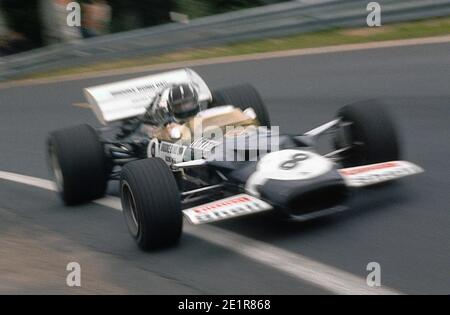 Graham HILL guida Lotus-Ford F1 a piena velocità durante il Gran Premio di Francia 1970, nel circuito di Charade vicino a Clermont-Ferrand. Foto Stock