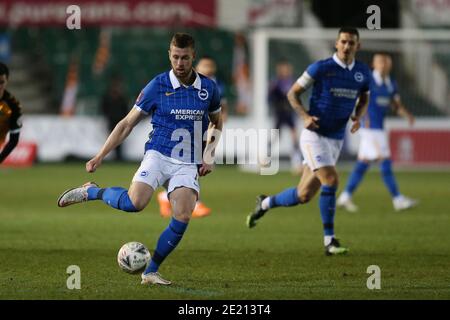 Newport, Galles del Sud, Regno Unito. 10 gennaio 2021. Newport, Regno Unito. 10 gennaio 2021. Adam Webster di Brighton & Hove Albion in azione. Emirates fa Cup, 3° round match, Newport County contro Brighton & Hove Albion alla Rodney Parade di Newport, Galles del Sud, domenica 10 gennaio 2021. Questa immagine può essere utilizzata solo per scopi editoriali. Solo per uso editoriale, è richiesta una licenza per uso commerciale. Nessun utilizzo nelle scommesse, nei giochi o nelle pubblicazioni di un singolo club/campionato/giocatore. pic di Andrew Orchard/Andrew Orchard sports photography/Alamy Live news Credit: Andrew Orchard sports photography/Alamy Live News Foto Stock
